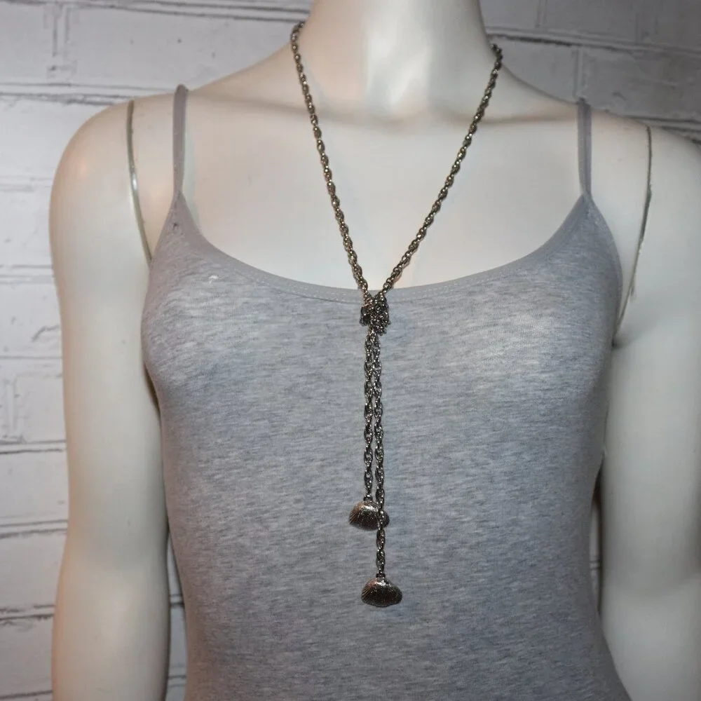 Beautiful vintage tied necklace with shell charms 40